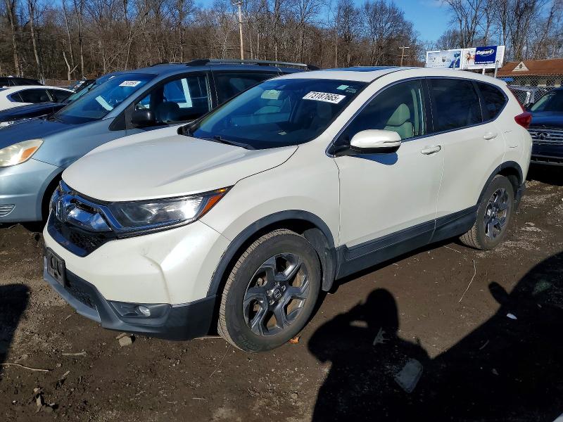 2018 HONDA CR-V — VIN 2HKRW2H58JH614560