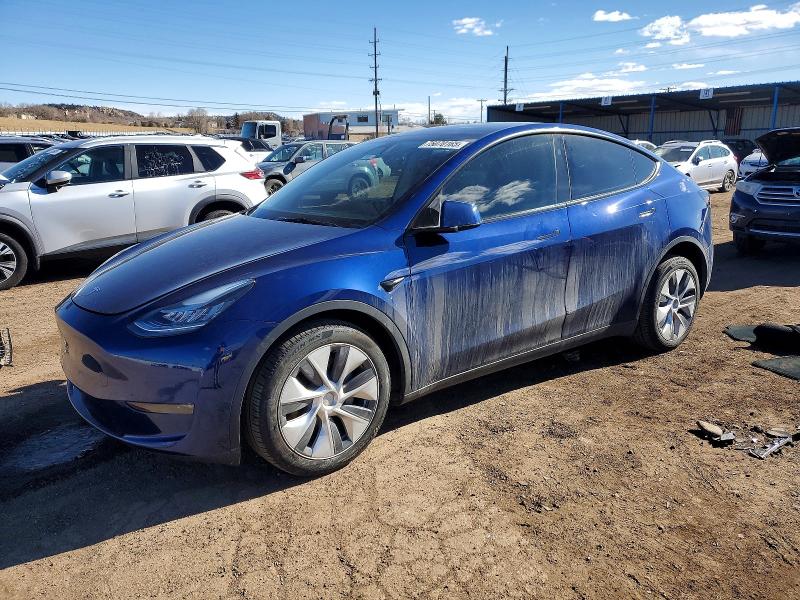 2023 TESLA MODEL Y — VIN 7SAYGDEE3PA140016