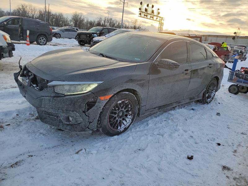 2018 HONDA CIVIC — VIN 19XFC2F57JE022084