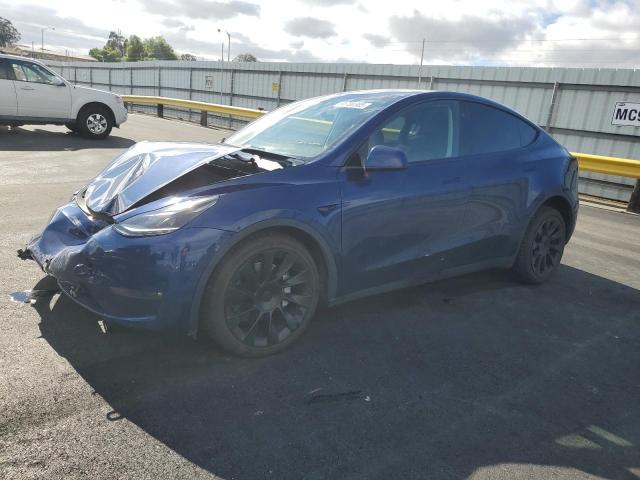 2023 TESLA MODEL Y — VIN 7SAYGDEE2PF972238
