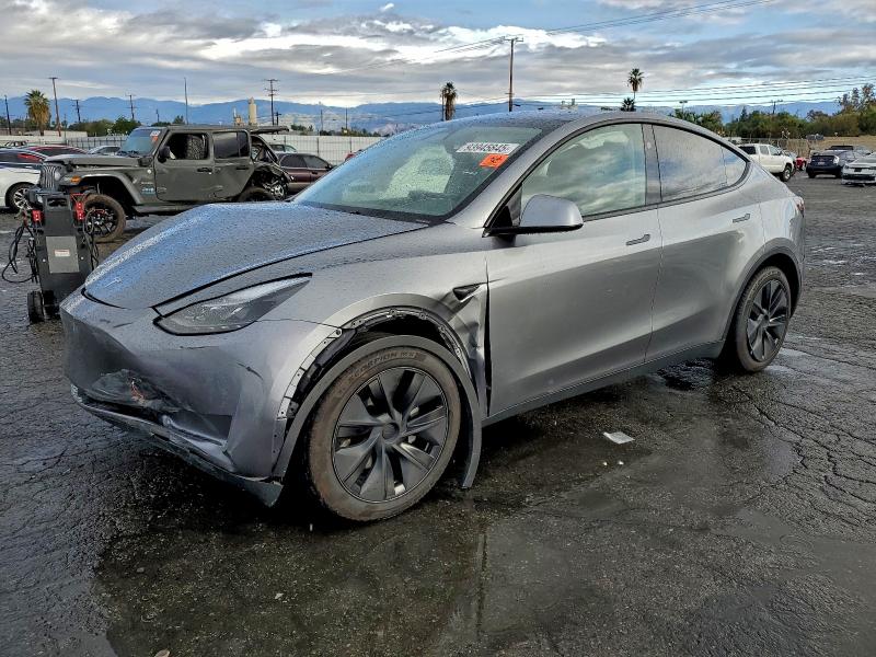 2025 TESLA MODEL Y — VIN 7SAYGDED4SF275802