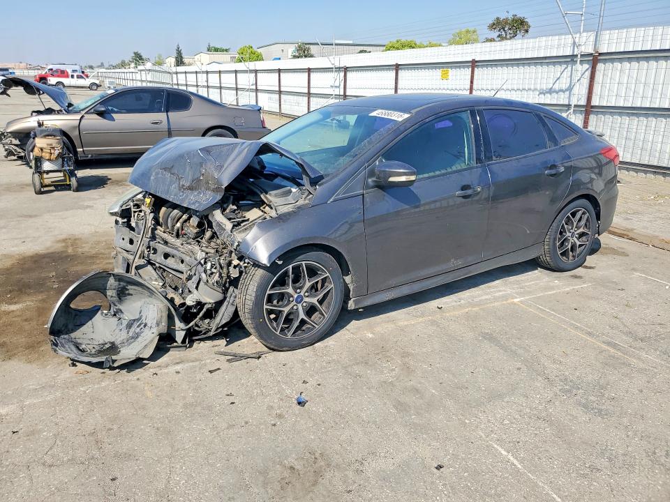 2015 FORD FOCUS — VIN 1FADP3F29FL324519