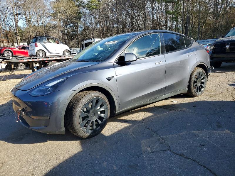 2023 TESLA MODEL Y — VIN 7SAYGAEE9PF707783