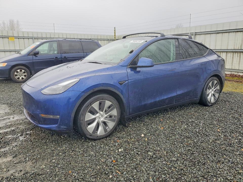 2023 TESLA MODEL Y — VIN 7SAYGAEE4PF741100
