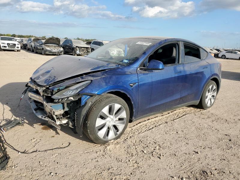 2023 TESLA MODEL Y — VIN 7SAYGDEE9PA137282