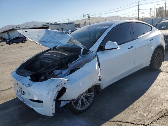 2023 TESLA MODEL Y — VIN 7SAYGAEE3PF977334