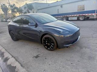2023 TESLA MODEL Y — VIN 7SAYGDEE2PA130691