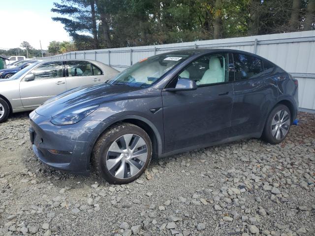 2023 TESLA MODEL Y — VIN 7SAYGAEE7PF843054