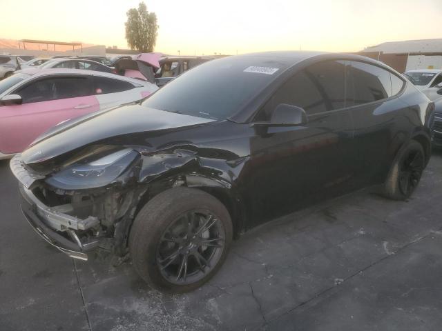 2025 TESLA MODEL Y — VIN 7SAYGDED9SF251091