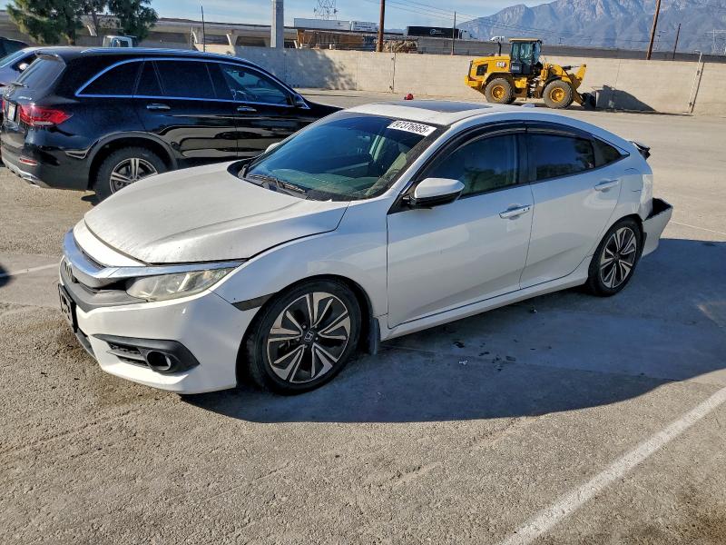 2018 HONDA CIVIC — VIN 19XFC1E33JE001081