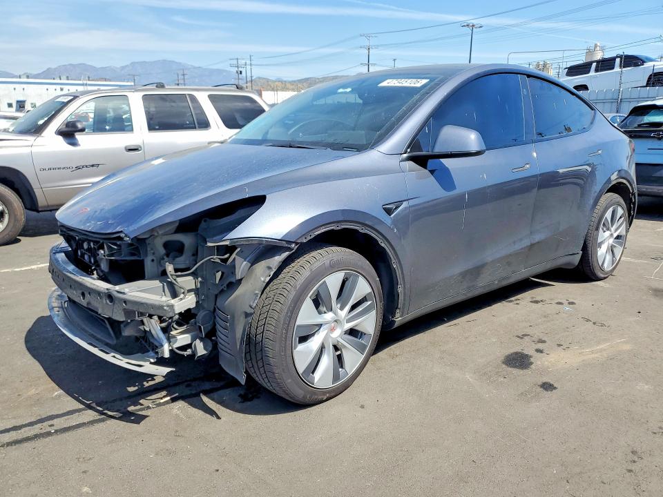 2023 TESLA MODEL Y — VIN 7SAYGDEE3PA136080