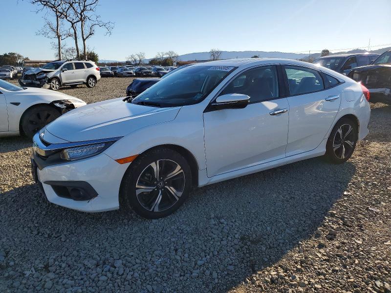 2017 HONDA CIVIC TOUR — VIN 19XFC1F9XHE213084