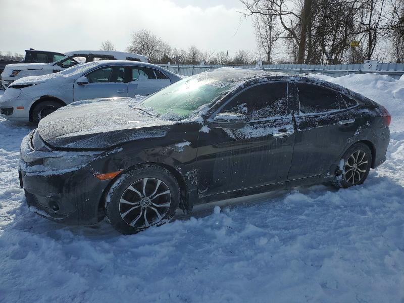 2016 HONDA CIVIC TOUR — VIN 2HGFC1F99GH112803