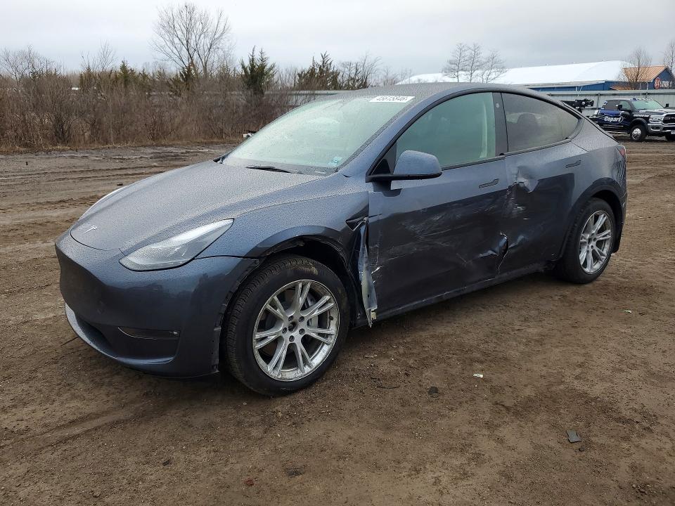 2023 TESLA MODEL Y — VIN 7SAYGAEE3PF788845