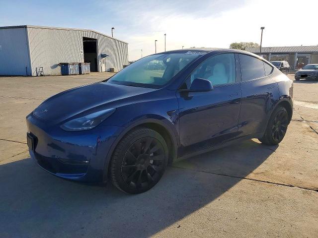 2023 TESLA MODEL Y — VIN 7SAYGDEE1PF883437