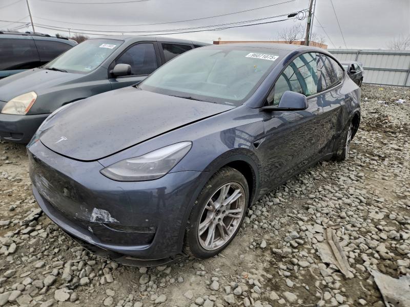 2023 TESLA MODEL Y — VIN 7SAYGDEE9PF848015