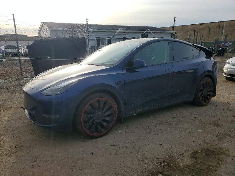 2023 TESLA MODEL Y — VIN 7SAYGDEF9PF766052