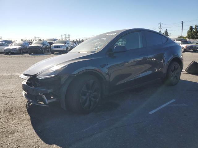 2025 TESLA MODEL Y — VIN 7SAYGDED7SF229994
