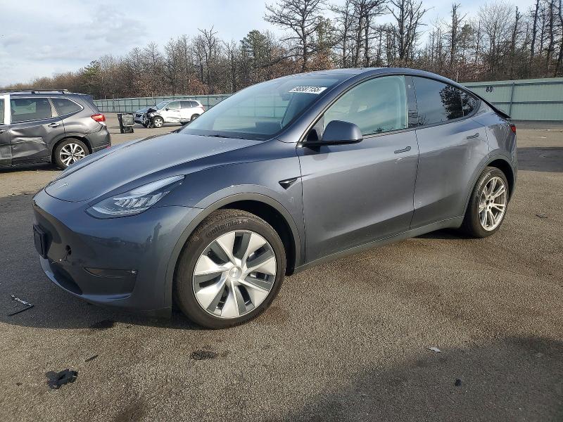 2023 TESLA MODEL Y — VIN 7SAYGAEE7PF604569