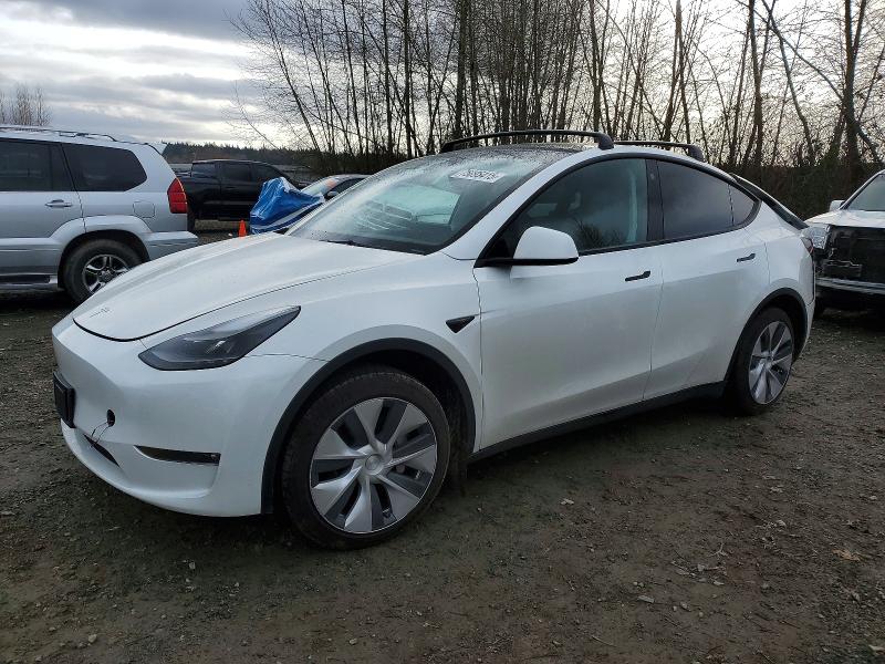 2023 TESLA MODEL Y — VIN 7SAYGAEEXPF672297