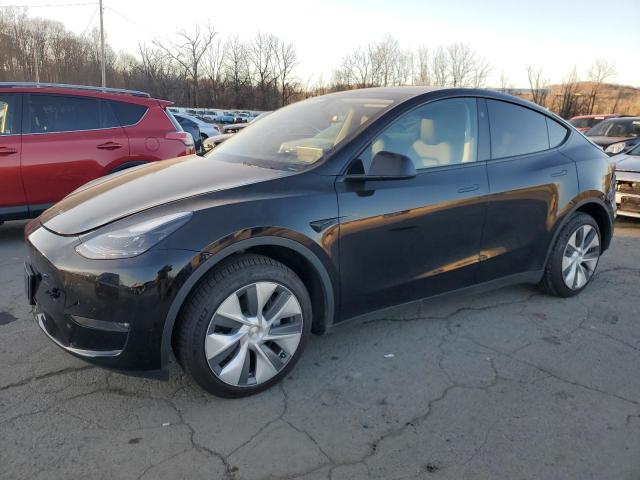 2023 TESLA MODEL Y — VIN 7SAYGDEE6PA187492
