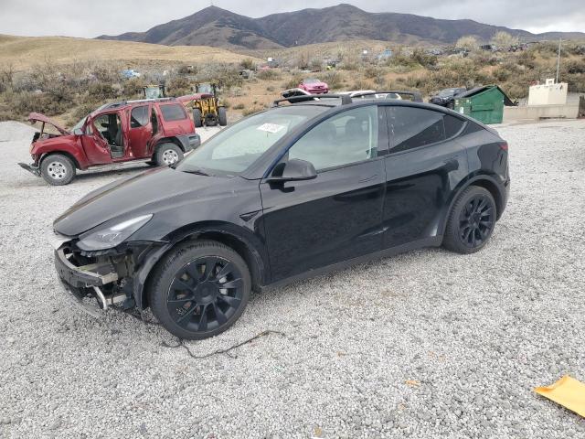 2023 TESLA MODEL Y — VIN 7SAYGAEE5PF620379