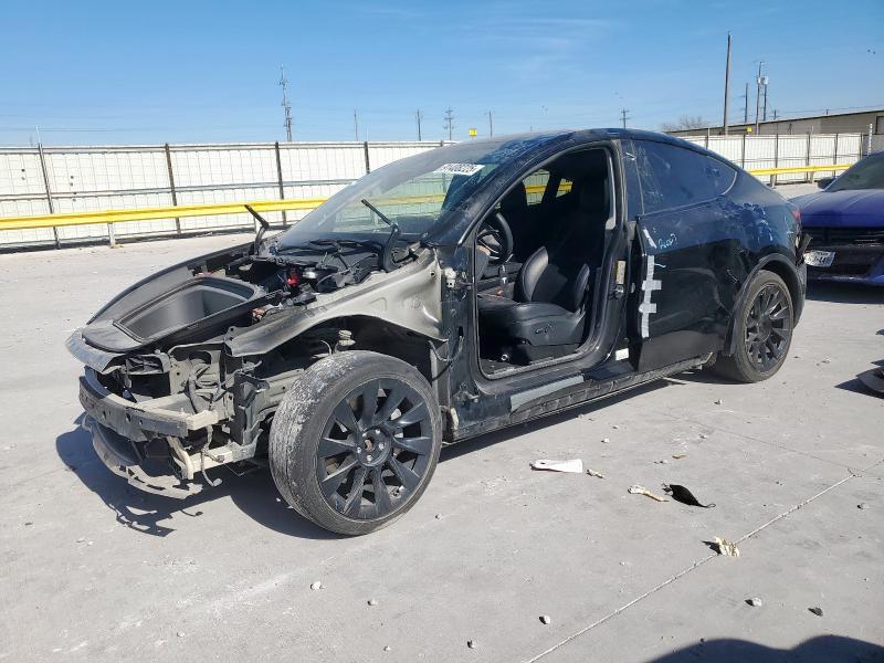 2023 TESLA MODEL Y — VIN 7SAYGDEE9PF907029
