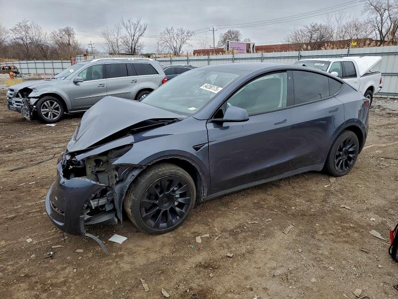 2023 TESLA MODEL Y — VIN 7SAYGAEE9PF750911