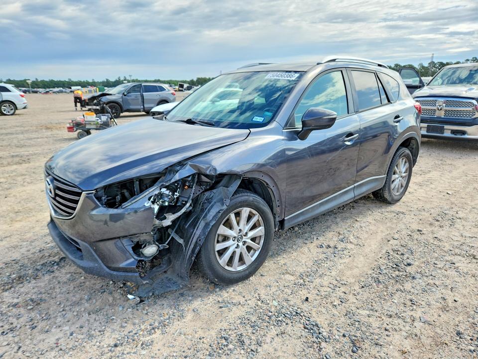 2016 MAZDA CX-5 — VIN JM3KE2CY2G0811677