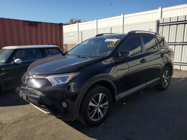 2018 TOYOTA RAV4 — VIN 2T3RFREV6JW778833