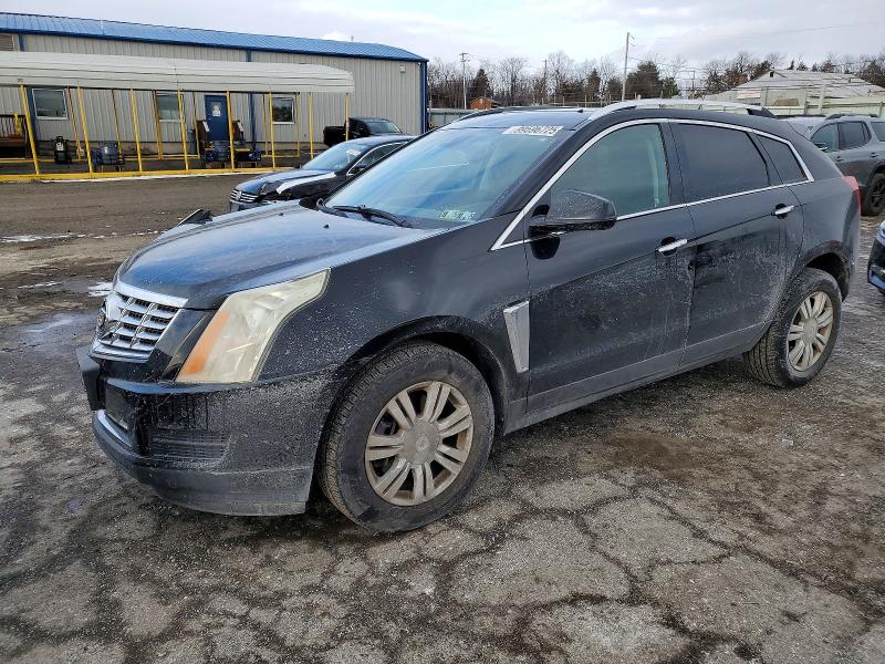 2015 CADILLAC SRX LUXURY — VIN 3GYFNBE39FS599521