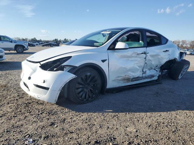 2023 TESLA MODEL Y — VIN 7SAYGDEE6PA126823