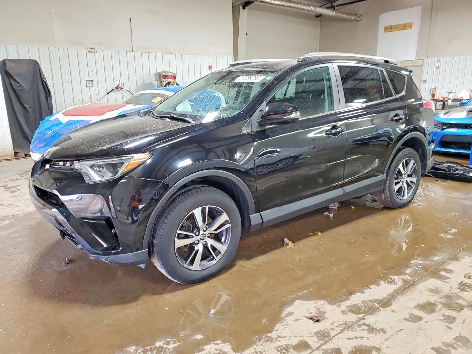 2018 TOYOTA RAV4 — VIN 2T3RFREV1JW761843