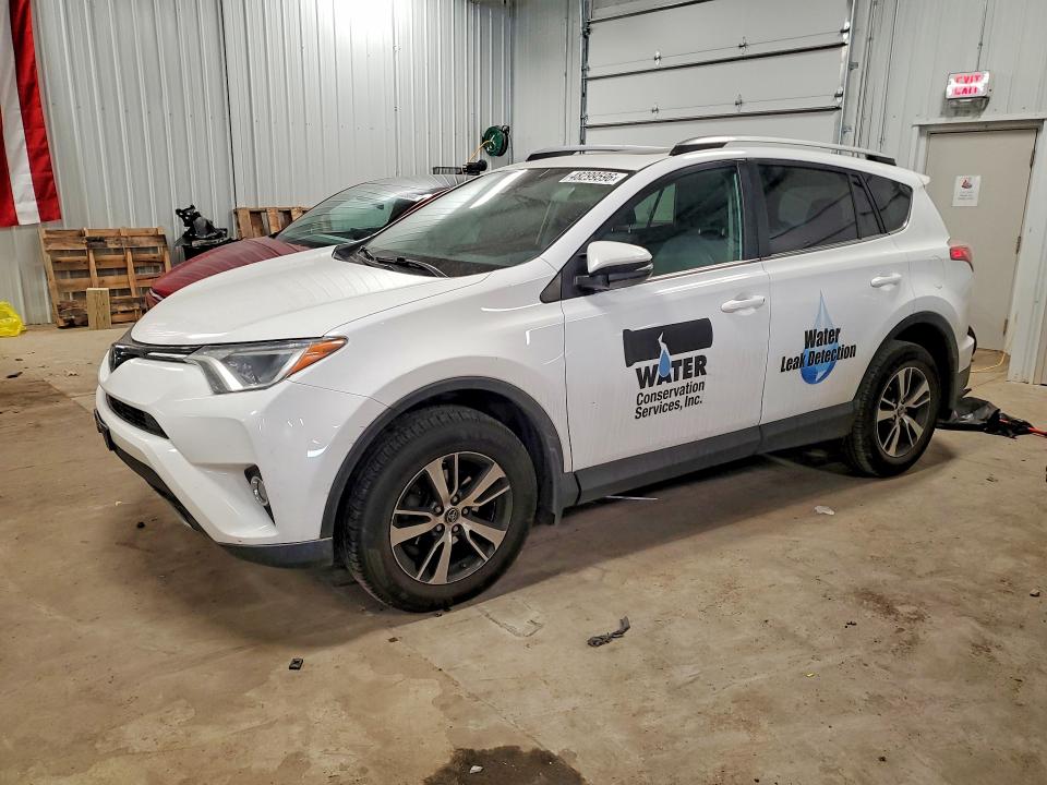 2018 TOYOTA RAV4 — VIN 2T3RFREV1JW855155