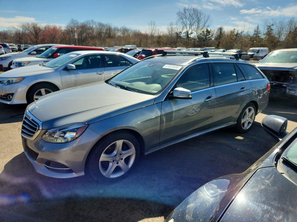 2015 MERCEDES-BENZ E — VIN WDDHH8JB7FB161586
