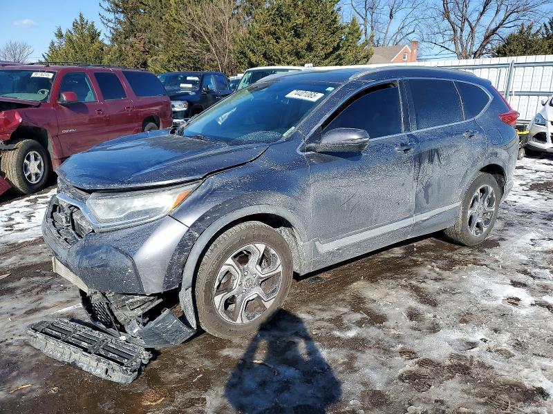 2017 HONDA CR-V — VIN 2HKRW2H9XHH659710