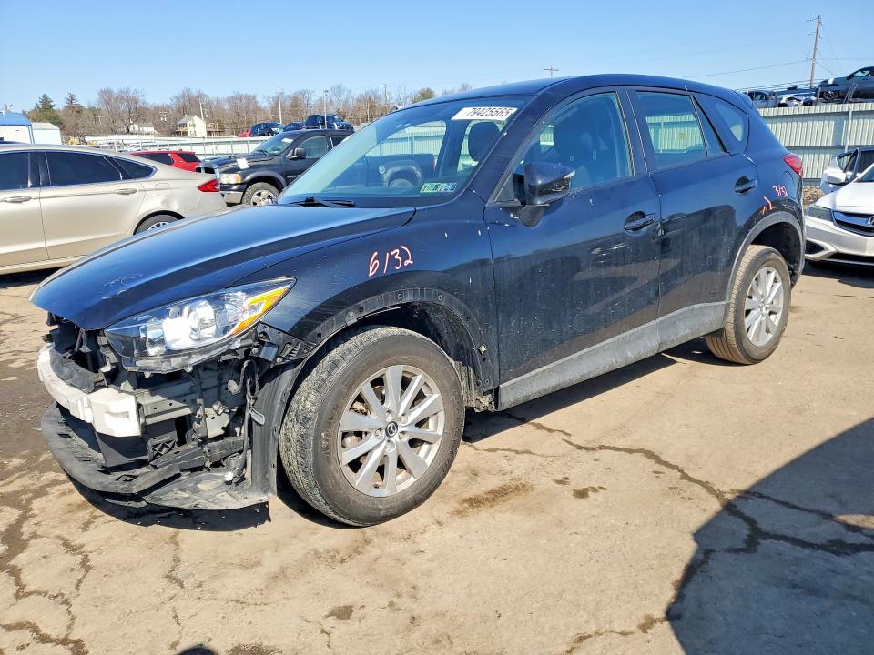 2016 MAZDA CX-5 — VIN JM3KE4BY1G0748990