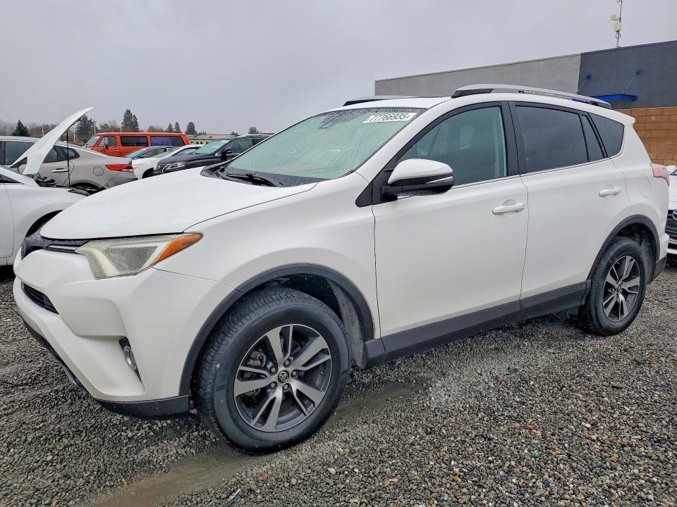 2018 TOYOTA RAV4 — VIN 2T3RFREV2JW797802