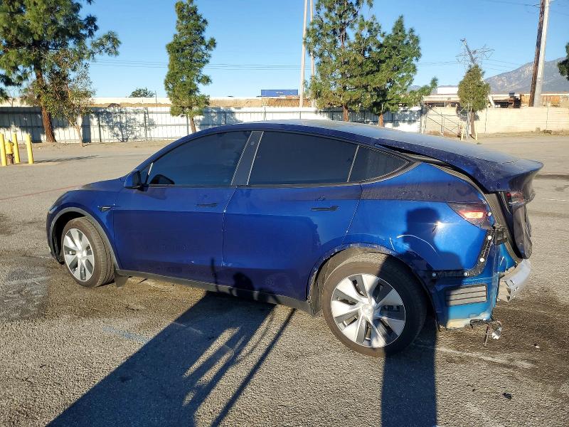 2023 TESLA MODEL Y — VIN 7SAYGDEE9PA095292