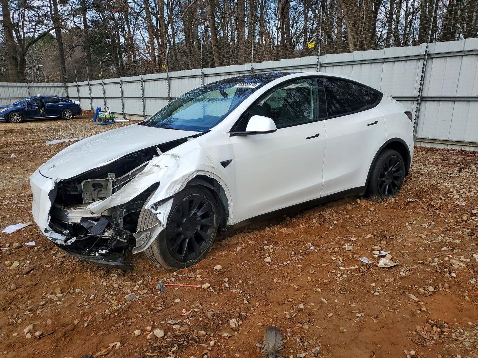 2023 TESLA MODEL Y — VIN 7SAYGDEE5PA070101