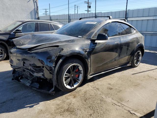 2024 TESLA MODEL Y — VIN 7SAYGAEE4RF177385